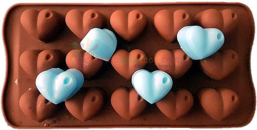 Herz mit Punkt Schokoladen Silikonform - Tortendekoshop
